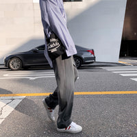 Draped trousers in grey colourway