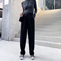High waist detail of draped wide leg trousers